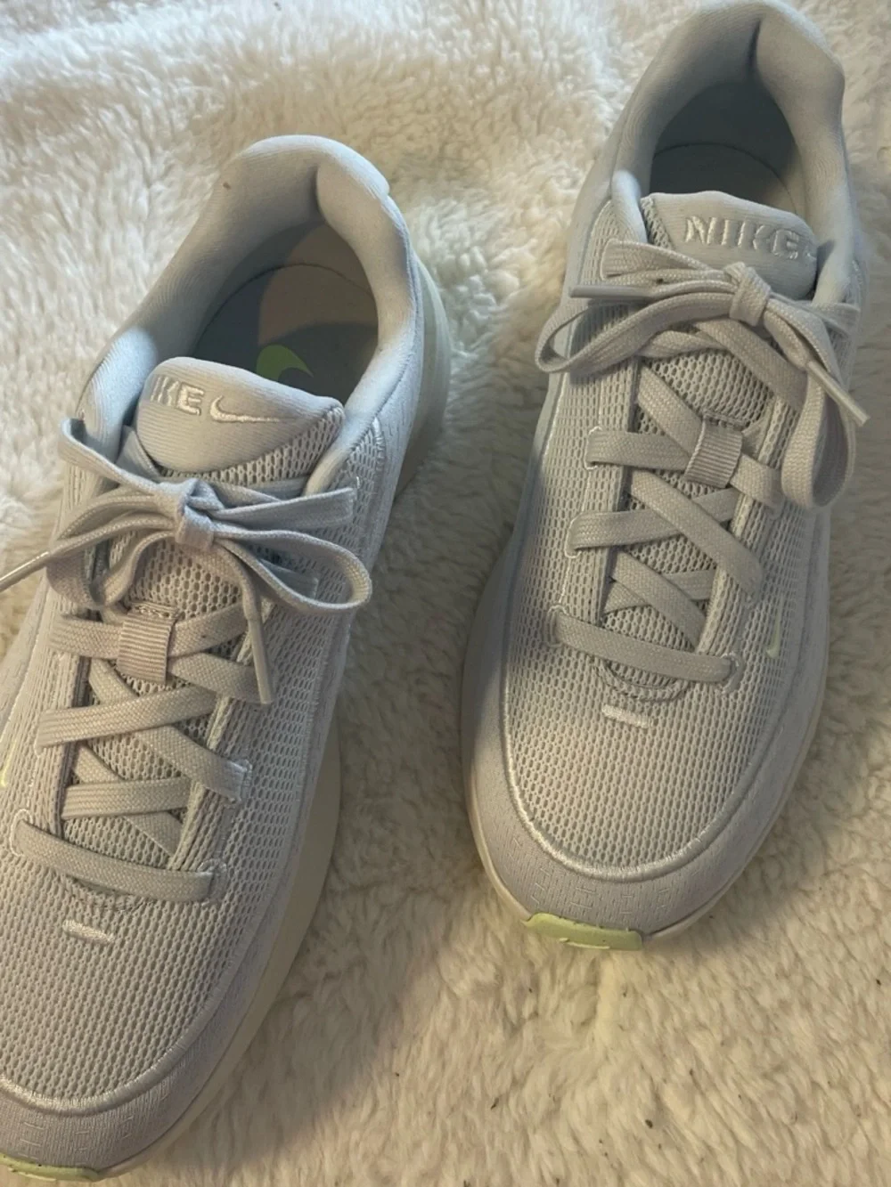 Nike White and Light Gray Sneakers with Subtle Black Swoosh